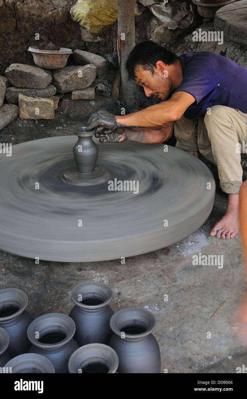 Man making ceramic pot, Bhaktapur Bhadgaon Kathmandu valley Nepali