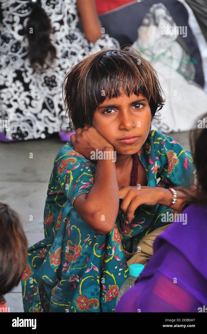 Pilgrim girl at Har Ki Pairi ghat by the Ganges River Stock Photo - Alamy