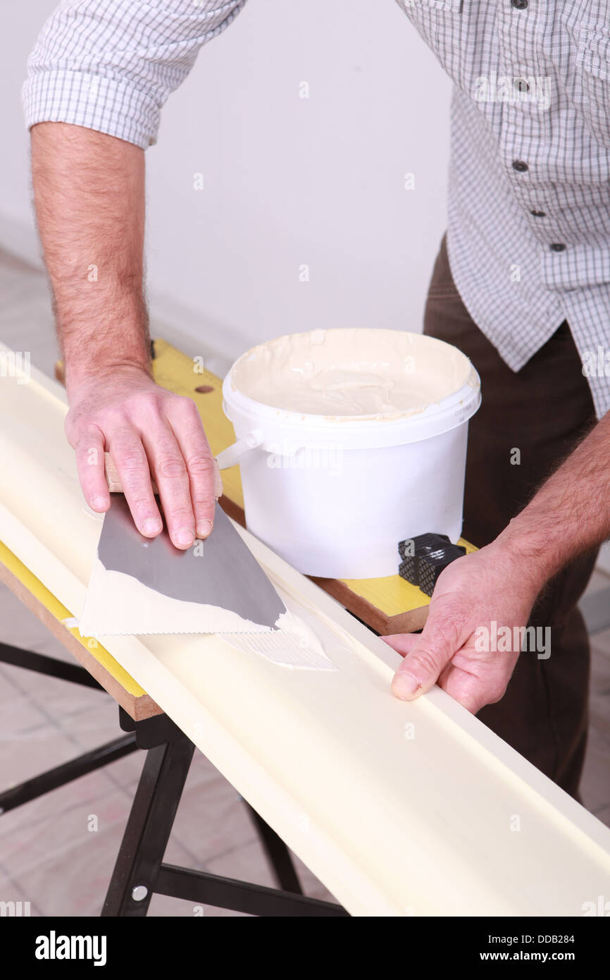 craftsman painting a board Stock Photo Alamy