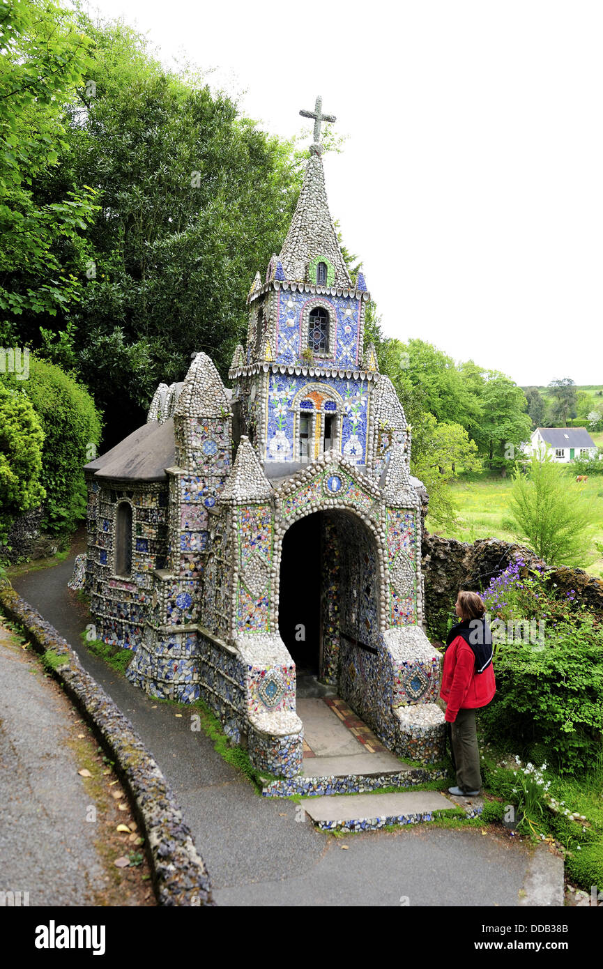 Little Chapel in St Saviours  A French priest built it at the bigining of the 20 century with seashell, pebbles and colourful Stock Photo