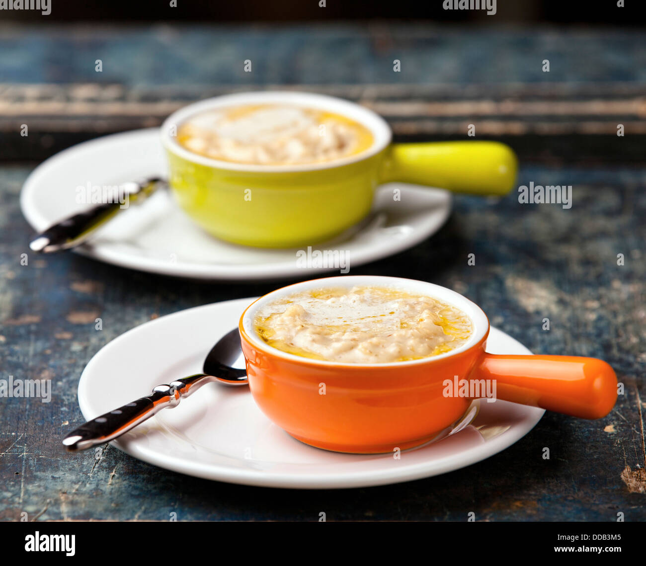 Oatmeal porridge on textured background Stock Photo