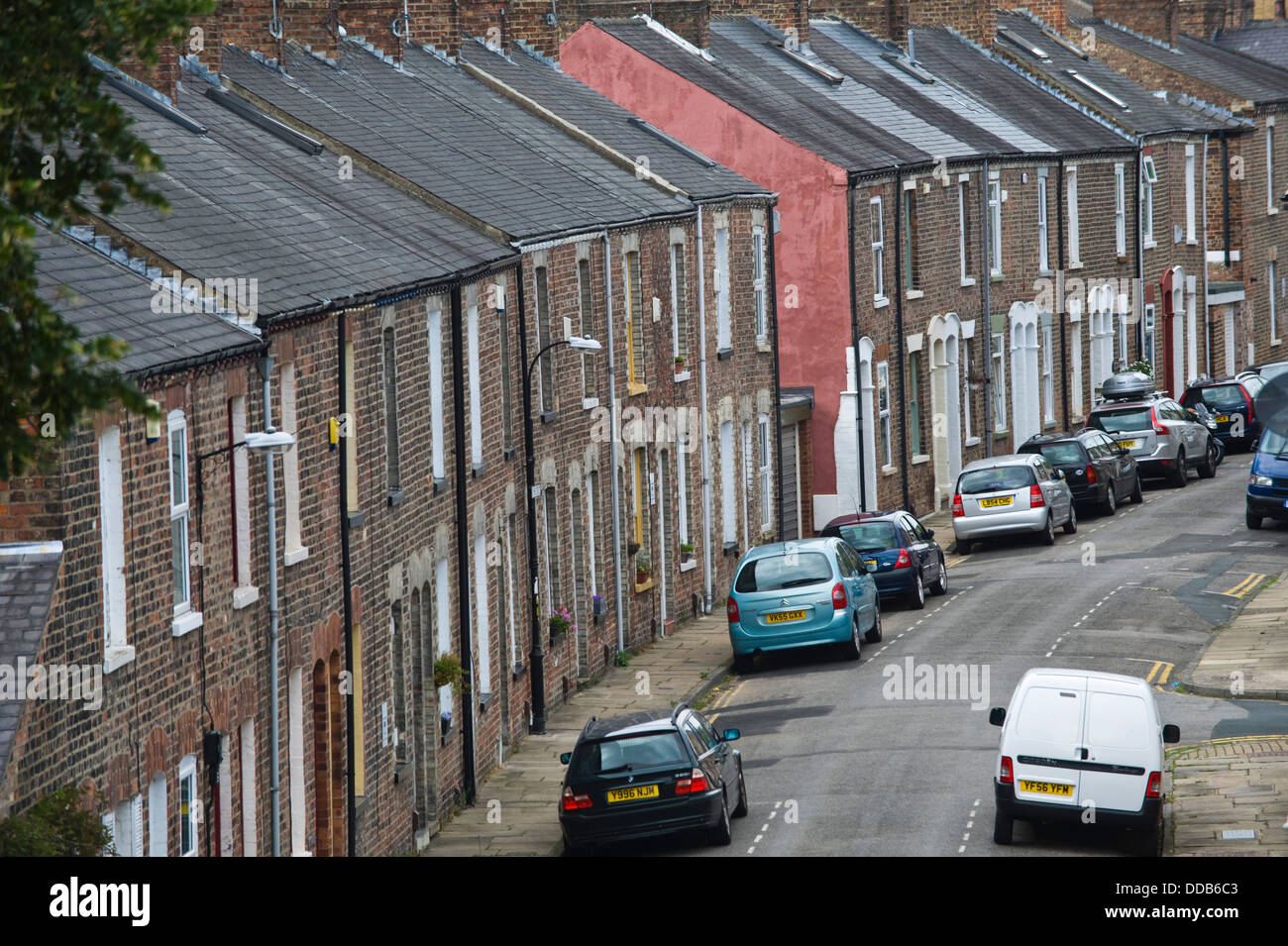 Traditional terraced housing with on street car parking within the city