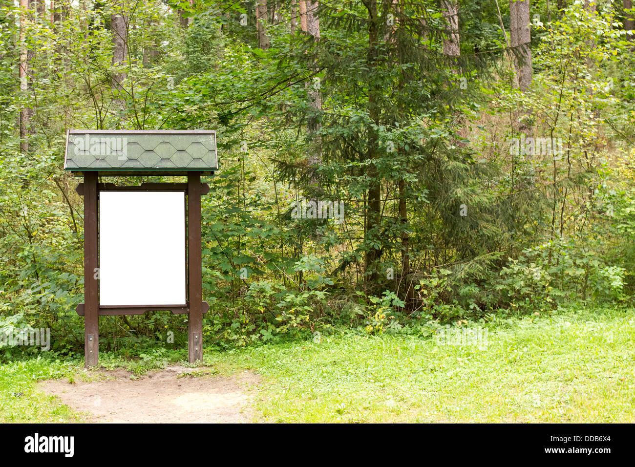 Blank wooden billboard in the green forest Stock Photo - Alamy