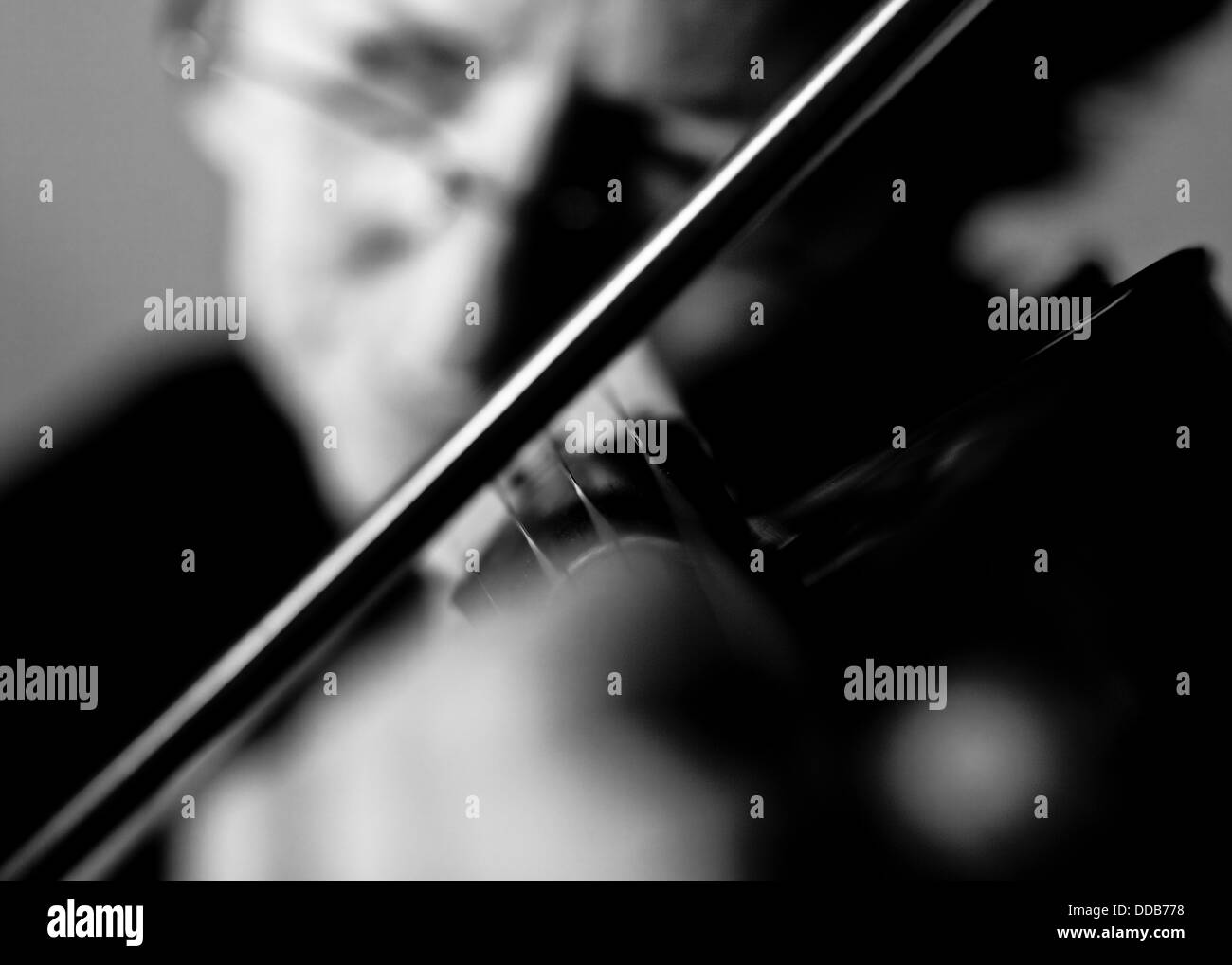 Violinist playing music  Violin  Black and white Stock Photo