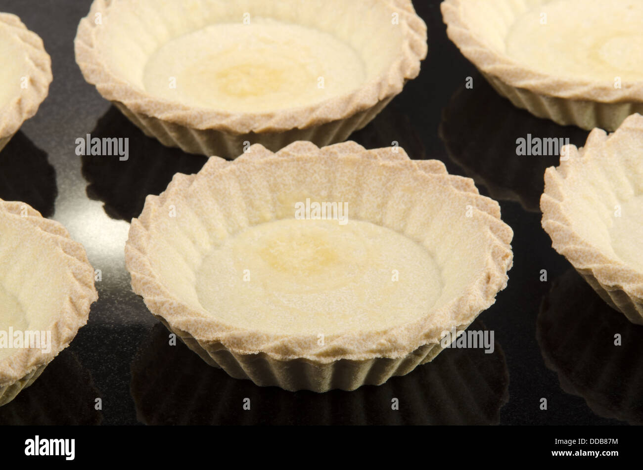 pastry cases on black marble Stock Photo
