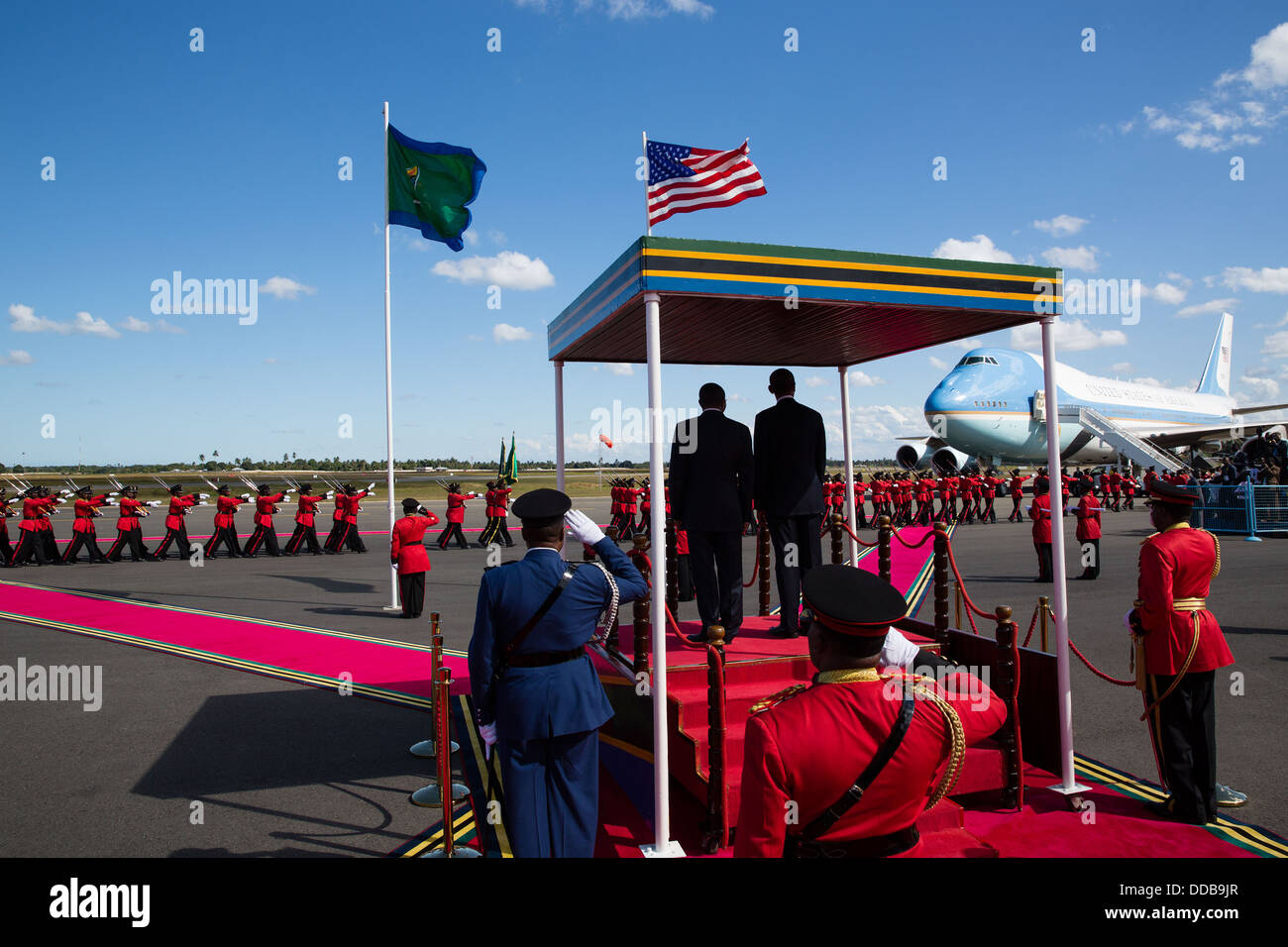 US President Barack Obama and President Jakaya Kikwete of Tanzania watch as an honor guard passes during an official arrival ceremony at Julius Nyerere International Airport July 1, 2013 in Dar es Salaam, Tanzania. Stock Photo