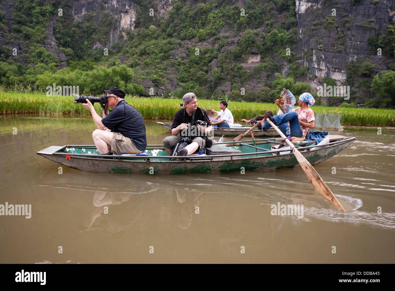 Tourist floating and photographing in Hua Lu Region of VIETNAM Stock ...