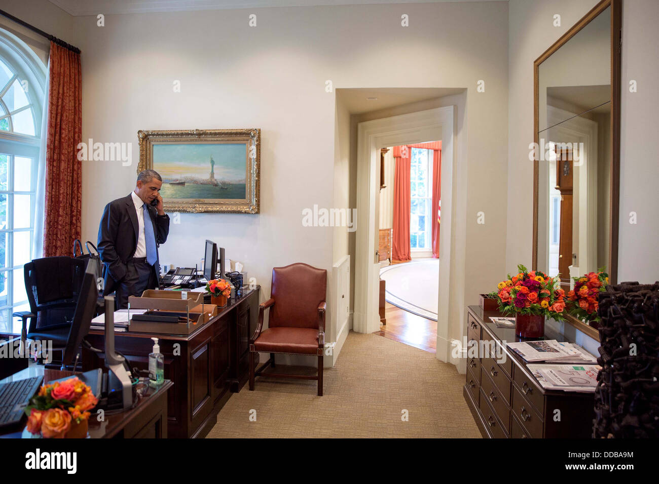 US President Barack Obama talks on the phone in the Outer Oval Office July 19, 2013 in Washington, DC. Stock Photo