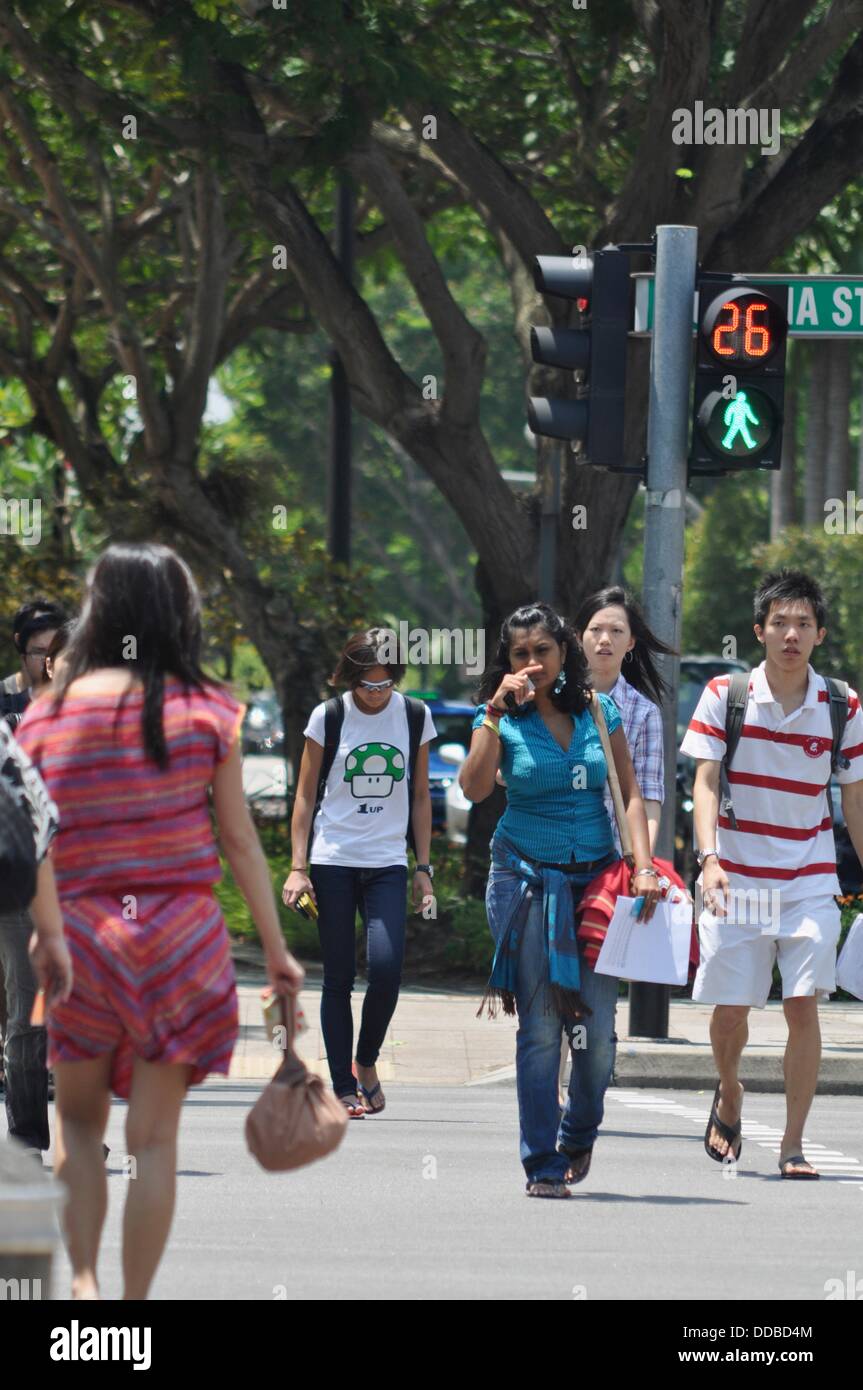 Singapore people crossing street in hi-res stock photography and images ...