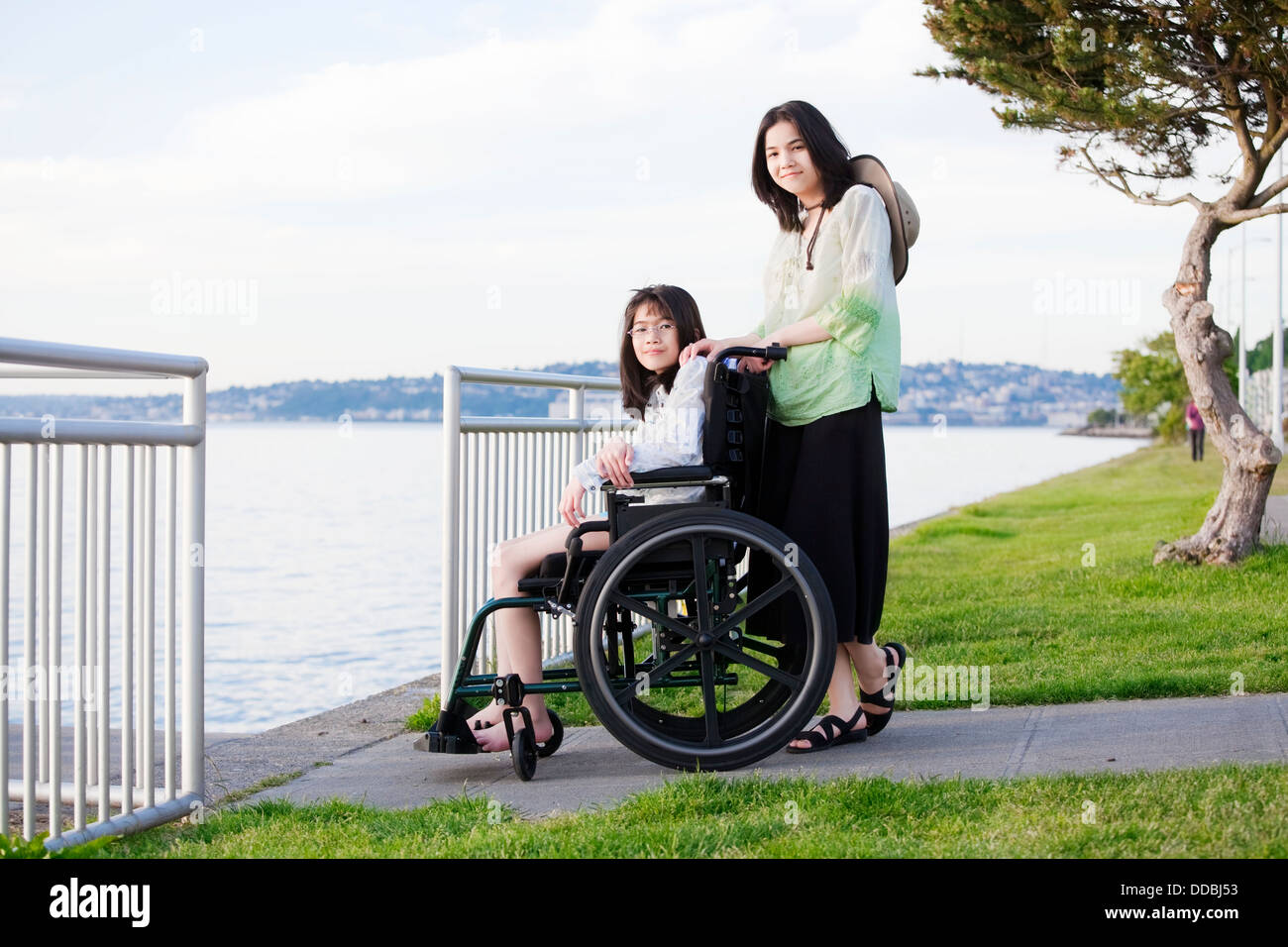Disabled teen girl wheelchair hi-res stock photography and images - Alamy