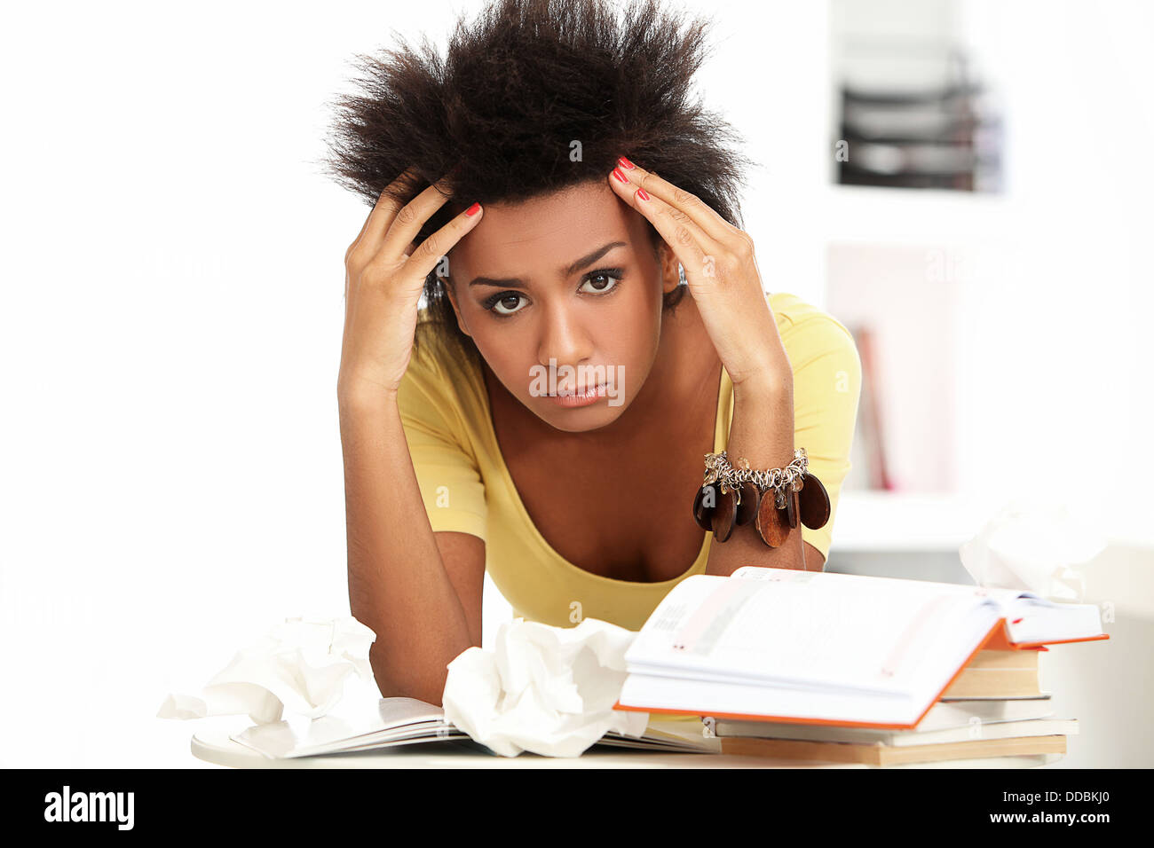 Young black woman tired from studying Stock Photo