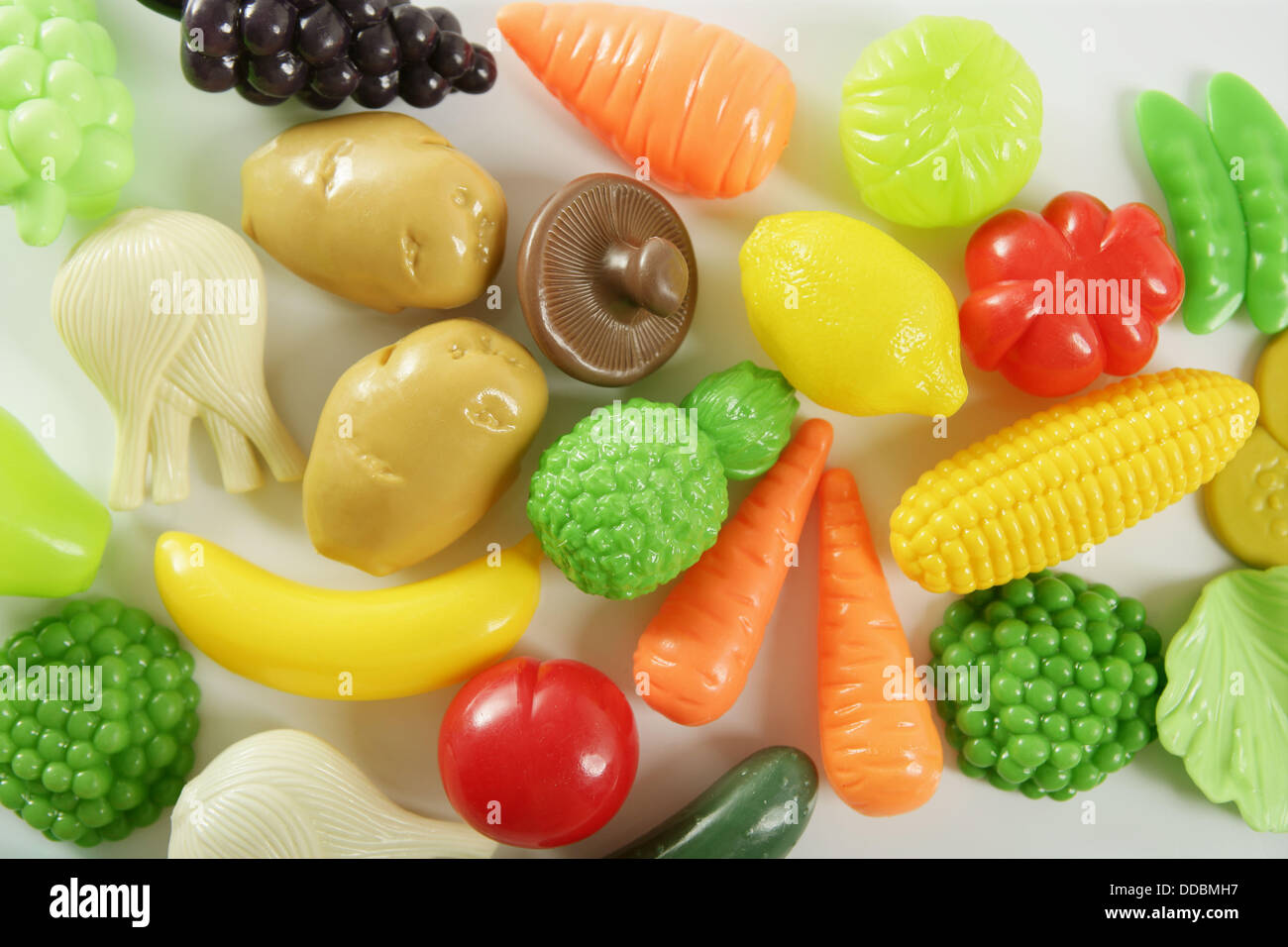 Plastic game, fake varied vegetables and fruits Stock Photo Alamy