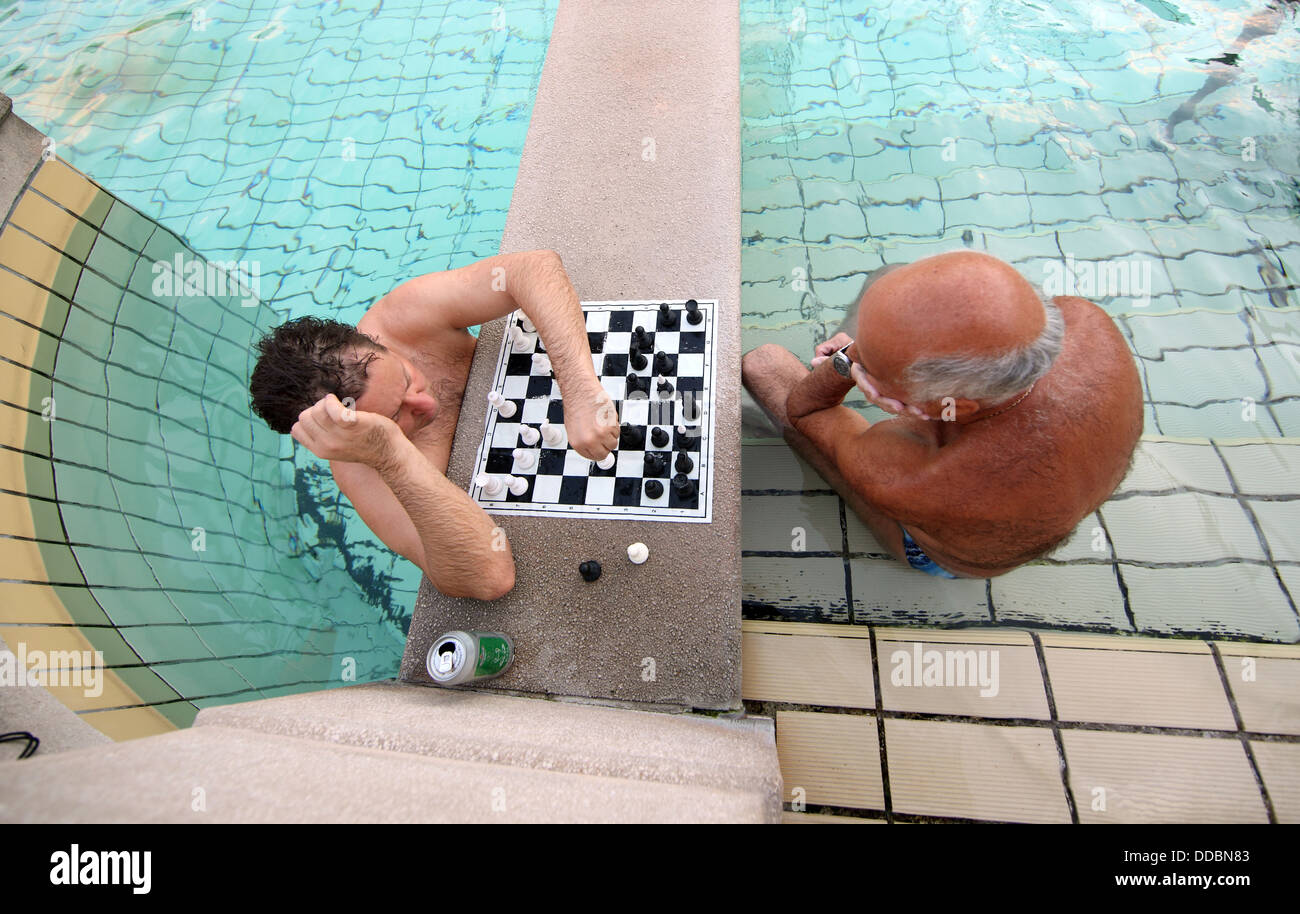 Budapest, Hungary, playing chess in an outdoor pool of the Szechenyi Thermal Baths Stock Photo