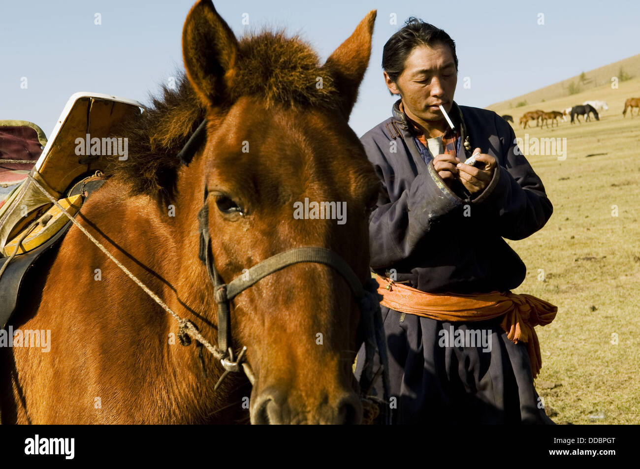 Mongolian nomads roam the vast Mongolian grasslands on their horses ...