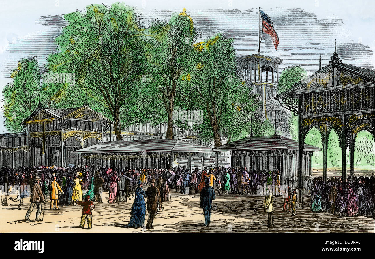 Crowds coming in the main entrance to the Centennial Exhibition, Philadelphia, 1876. Hand-colored woodcut Stock Photo