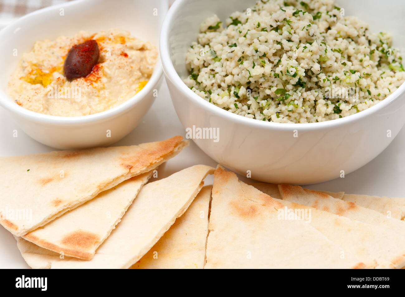 taboulii couscous with hummus Stock Photo Alamy