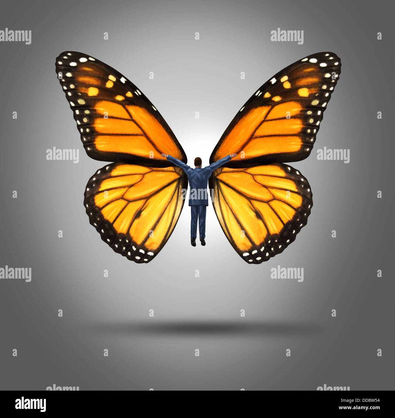 Creative leadership concept with a businessman flying up by using the wings of a monarch butterfly as a symbol of innovation and freedom of expression to aspire to higher goals of success through confidence and belief. Stock Photo