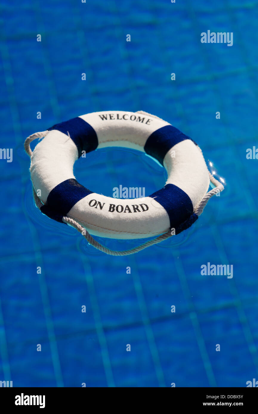 Life buoy in the swimming pool Stock Photo