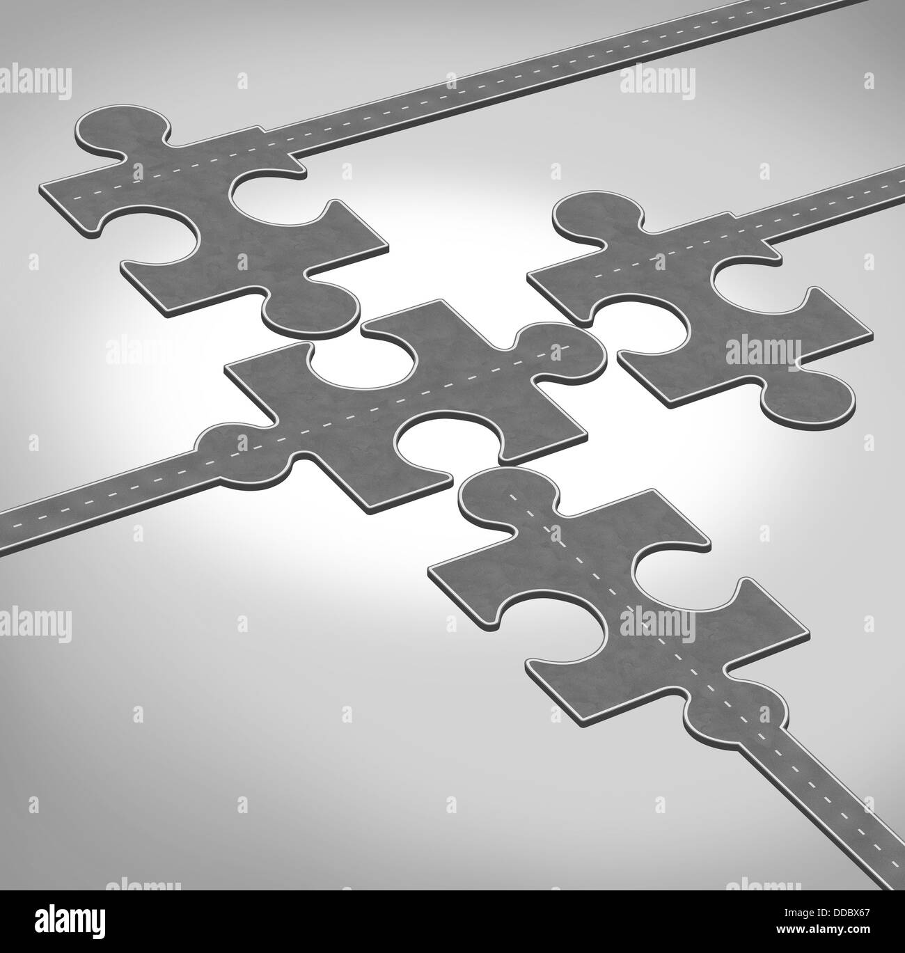 Connection direction as a business concept of a group of roads or highways shaped as jigsaw puzzle pieces connecting together as a team partnership bridging the gap for financial success through creative solutions. Stock Photo