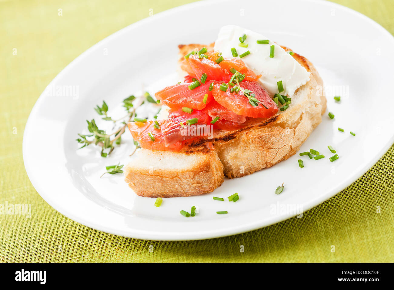 Bruschetta with soft cheese and smoked salmon Stock Photo