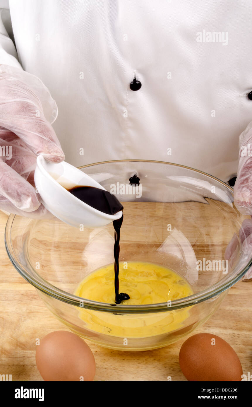 malt vinegar is filled into a bowl Stock Photo Alamy