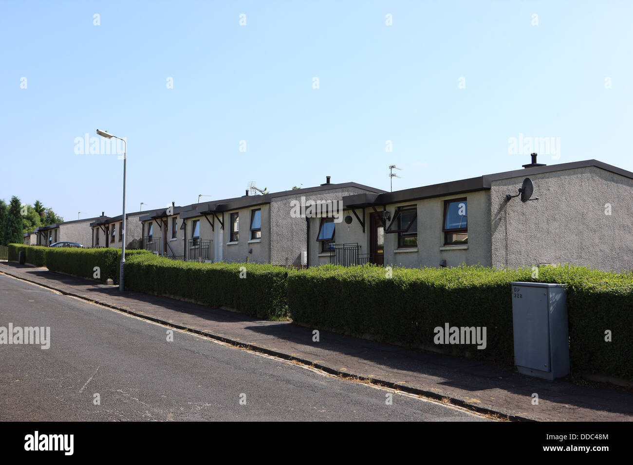 Row of post war prefabricated houses in Paisley Scotland Stock Photo