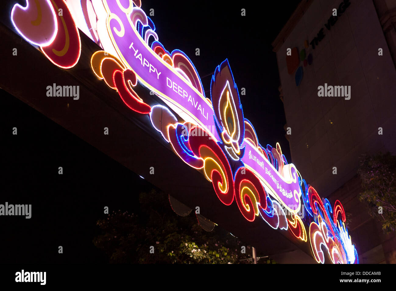 Decorations illuminated across the streets celebrate the Hindi festival of Diwali or Deepavali the Asian city state of Singapore Stock Photo