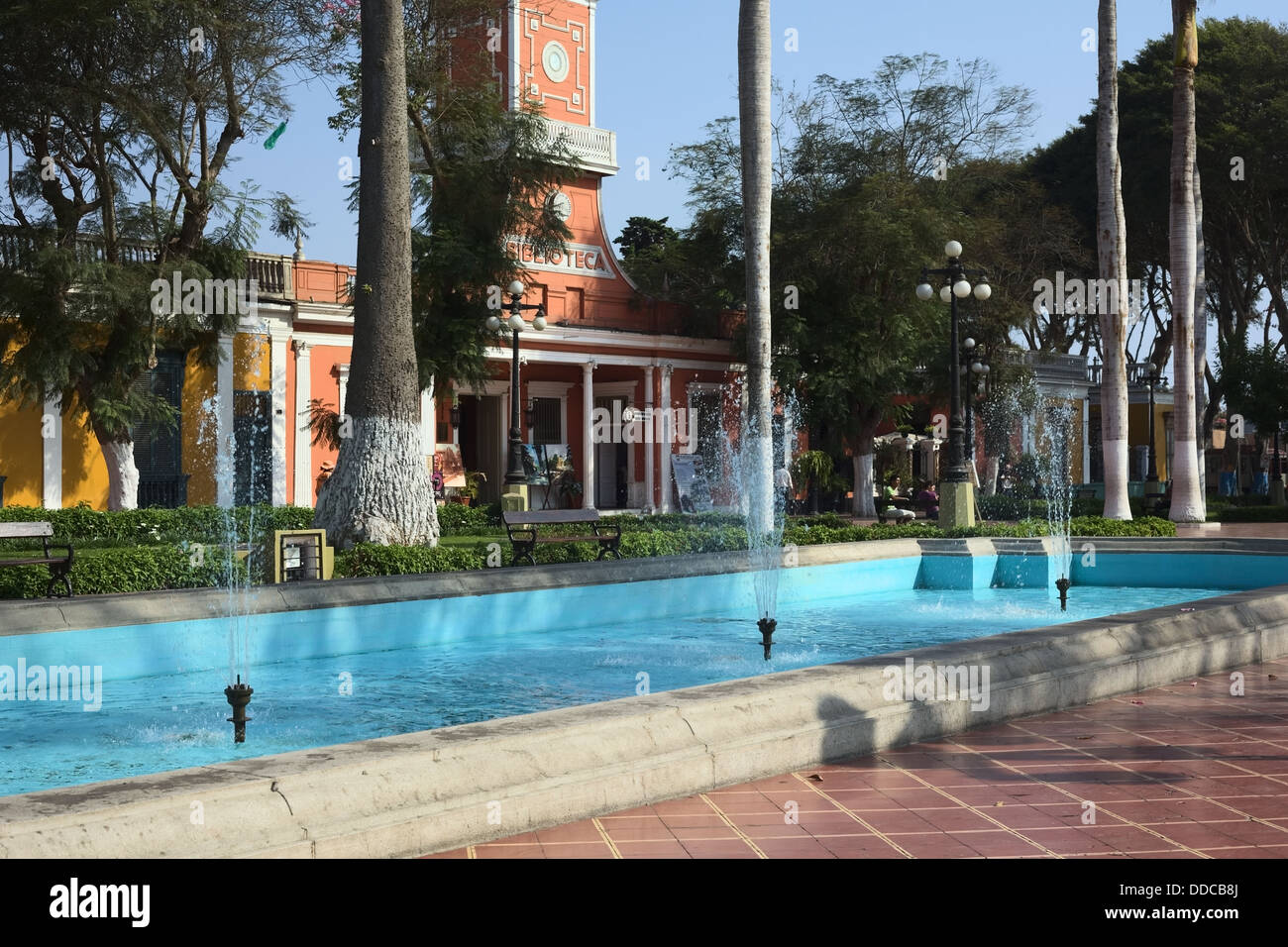 Parque Municipal with a fountain in the front and the building called Biblioteca in the back in Barranco, Lima, Peru Stock Photo