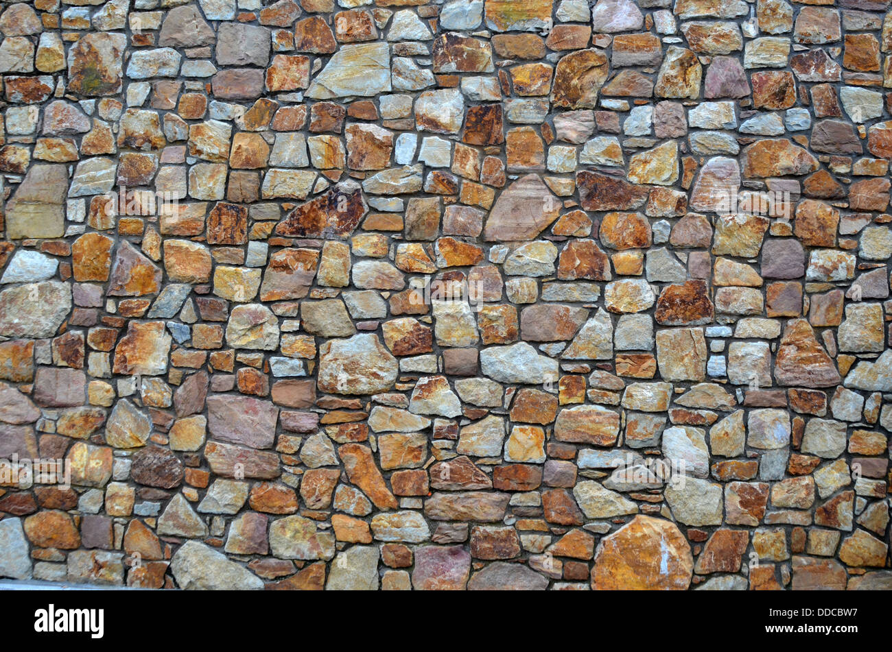 stone wall of natural stones Stock Photo