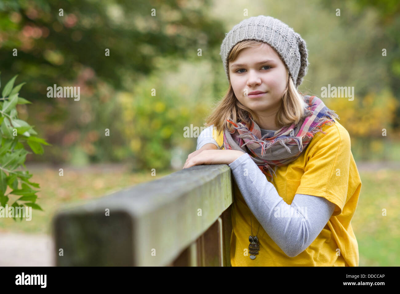 cute little girl in the autumn park Stock Photo - Alamy