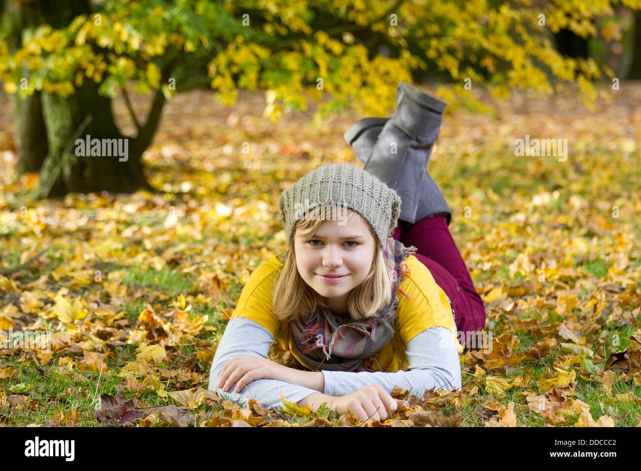 cute little girl in the autumn park Stock Photo - Alamy