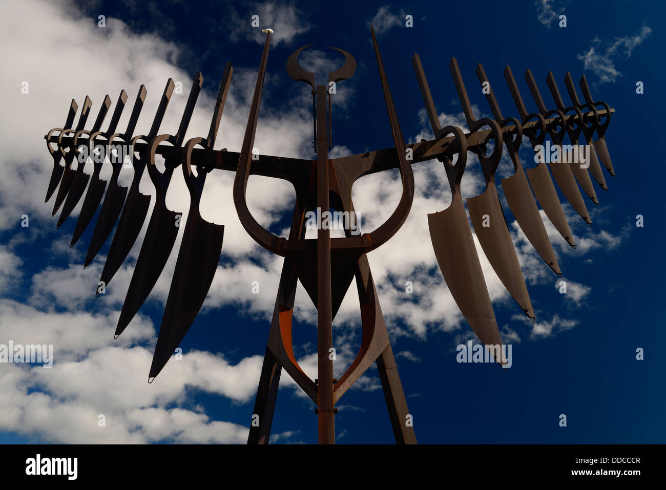 Morning sun on Spirit Catcher sculpture in Barrie Ontario Canada against a blue sky with clouds Stock Photo