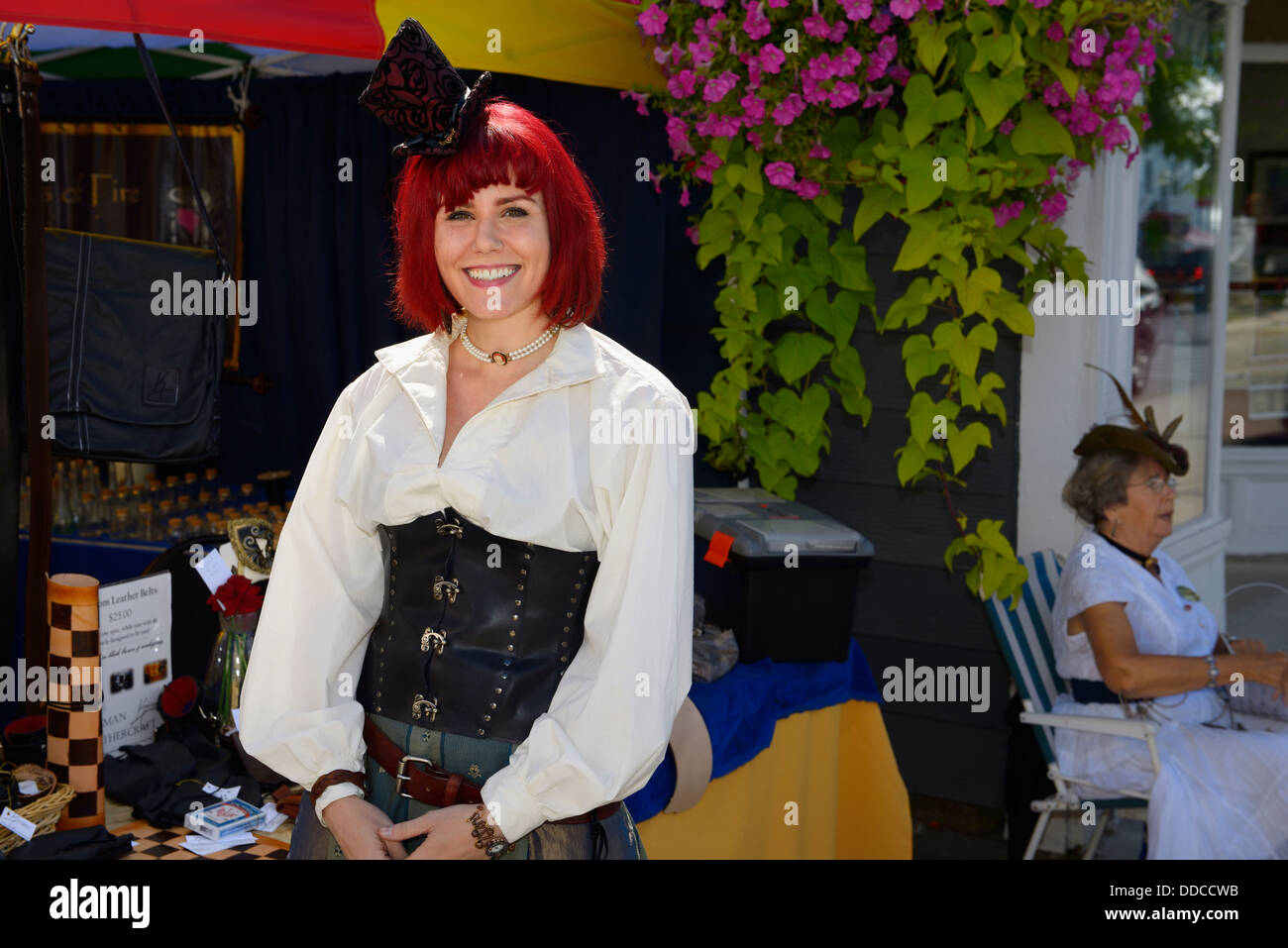 Pretty young woman with red hair dressed up for the steampunk festival in Coldwater Ontario Stock Photo