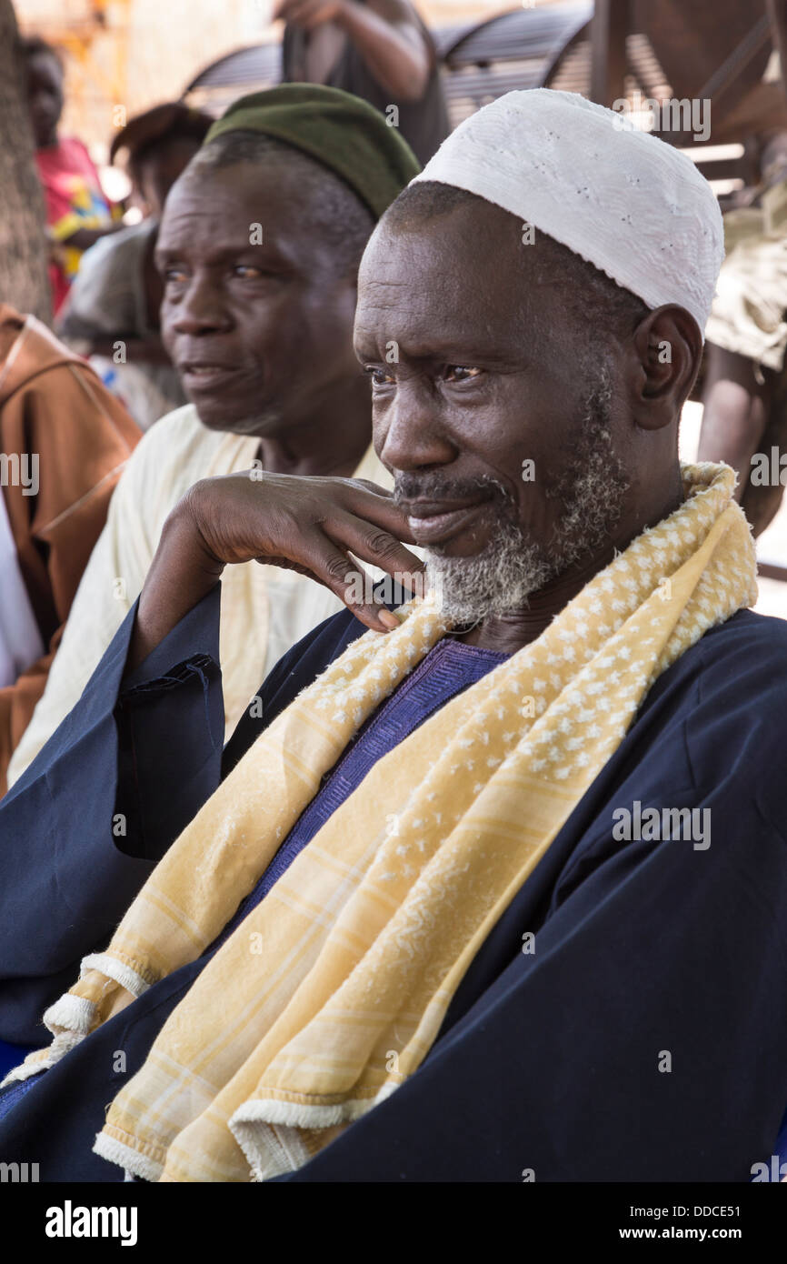 Wolof-speaking Senegalese men attending a Microcredit Meeting at Djilor, a Wolof Village, near Kaolack, Senegal. Stock Photo