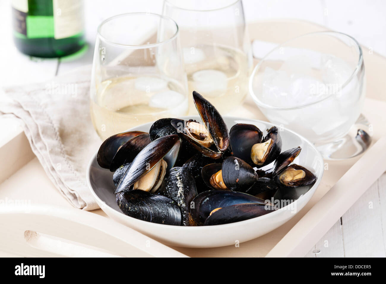 Mussels and clams with white wine Stock Photo Alamy
