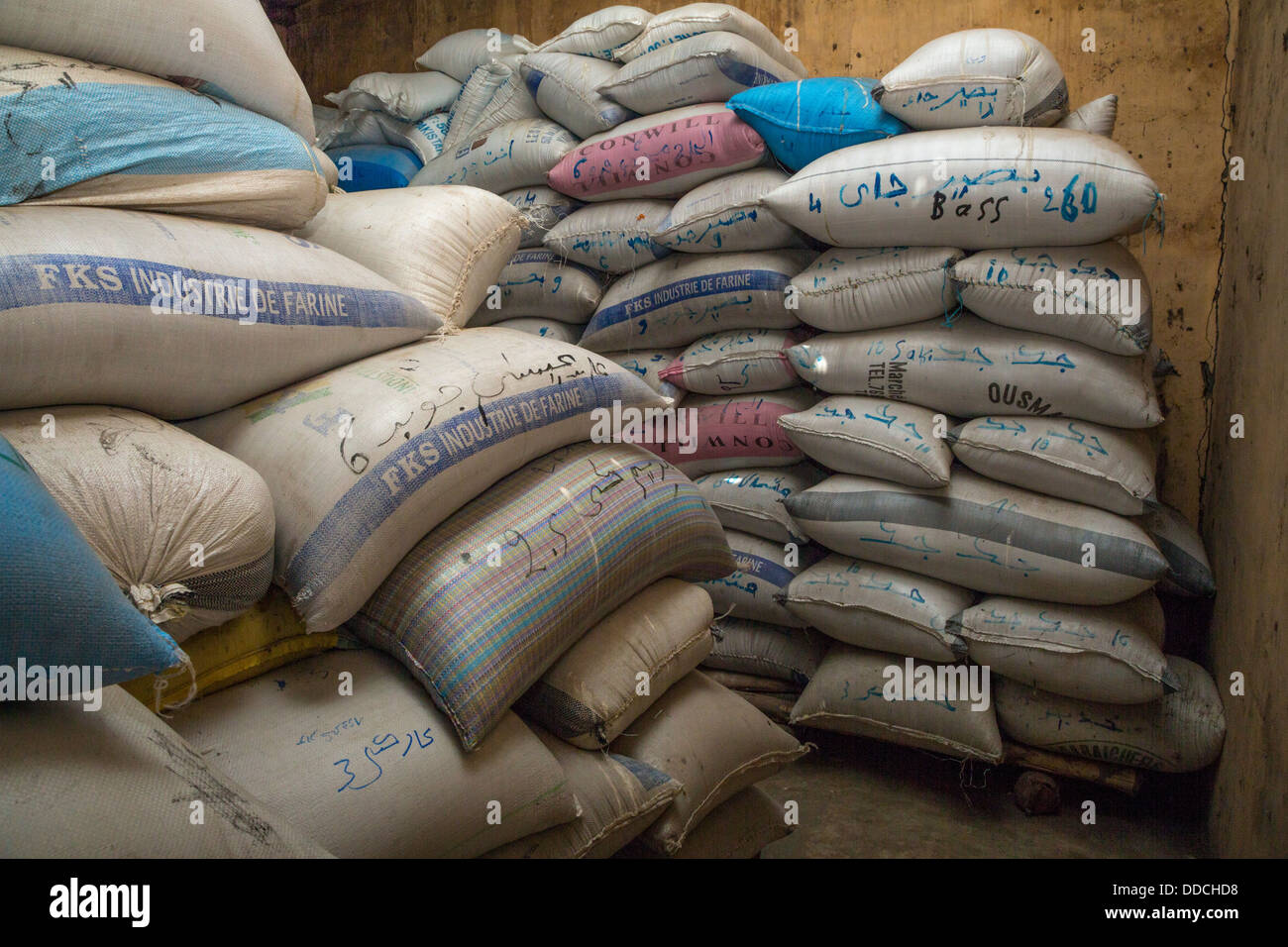Family Bags of Millet in Storehouse, Bijam, a Wolof Village, near Kaolack, Senegal. Stock Photo