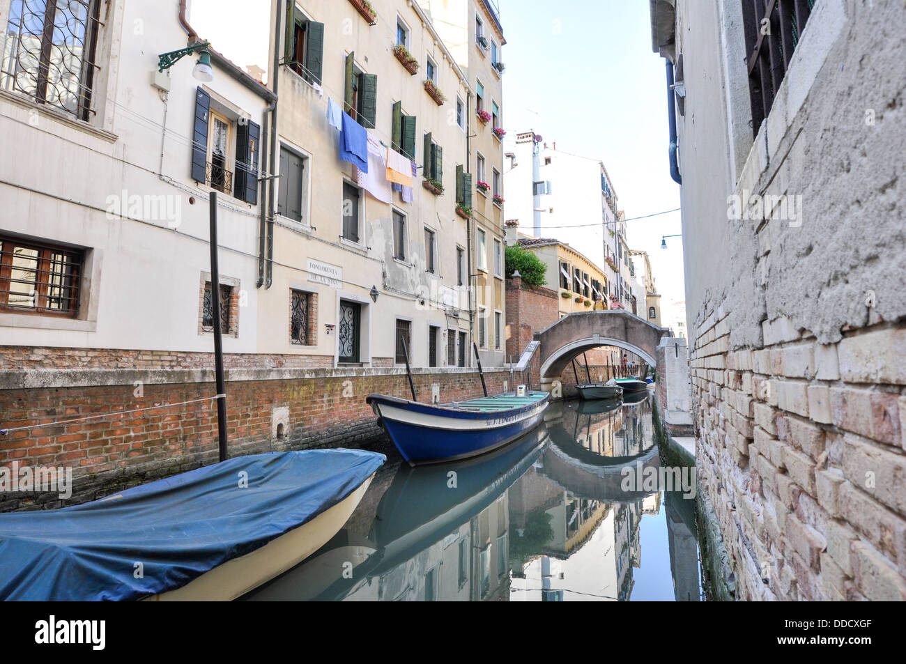 Water scene with multi colored houses of Venice Italy Stock Photo - Alamy