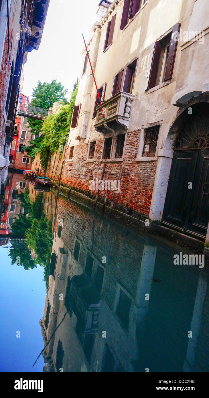 Water scene with multi colored houses of Venice Italy Stock Photo - Alamy