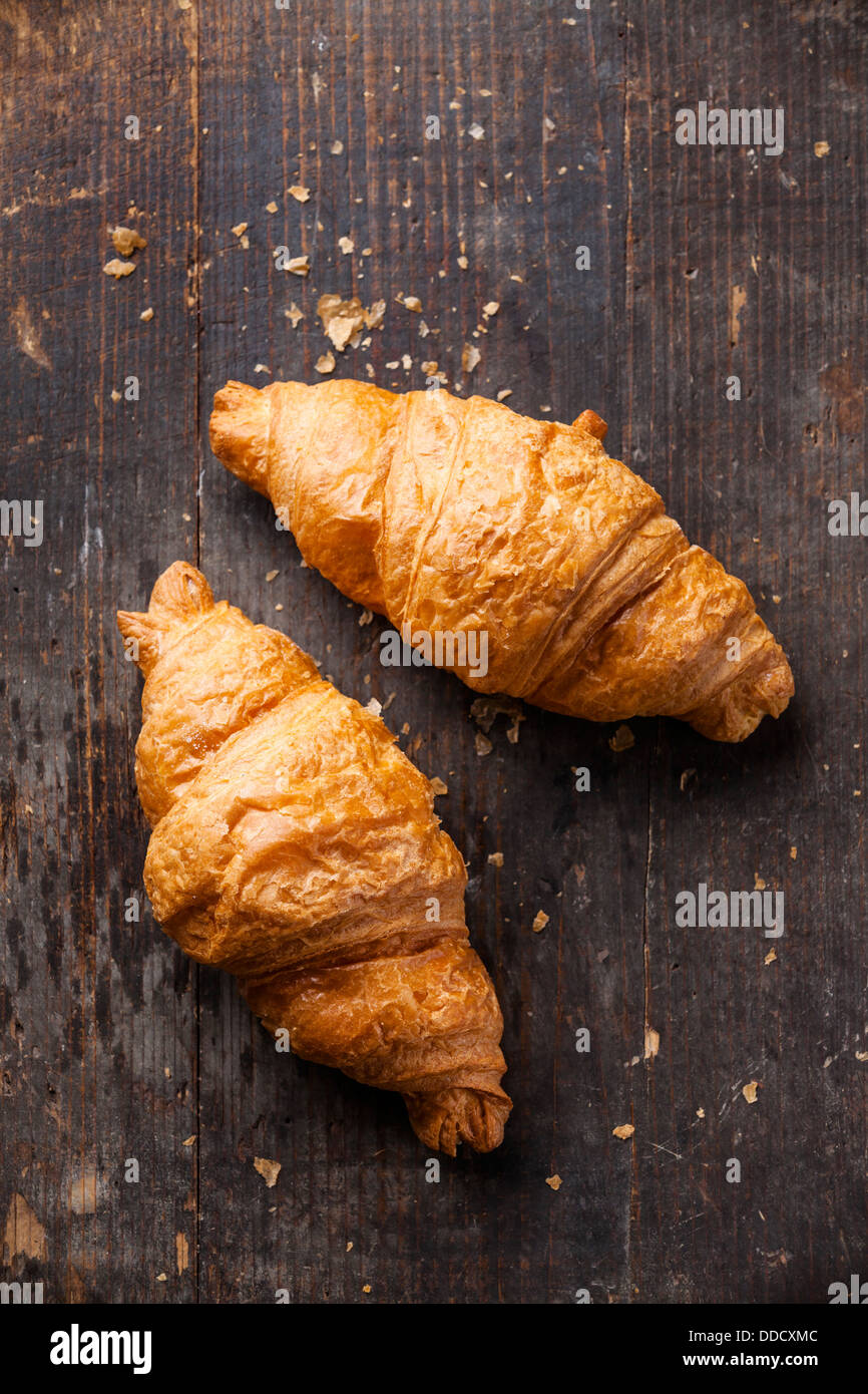 Croissants on wooden background Stock Photo