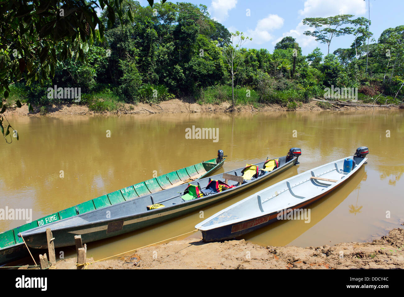 Canoes beside the Rio Cononaco in the Ecuadorian Amazon Stock Photo