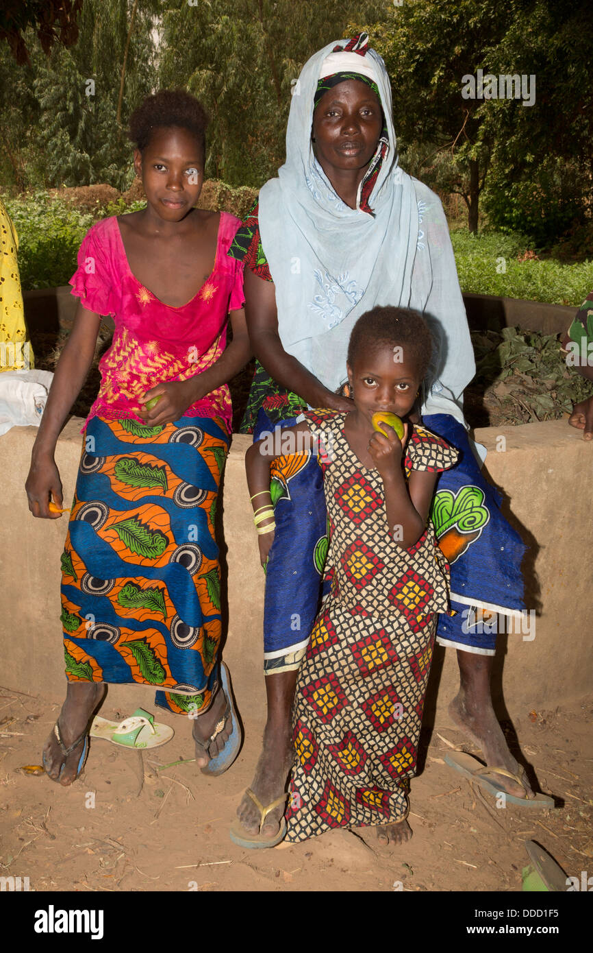 Wolof Woman, Young Woman, and Child. Dialacouna Gardening Project, near Kaolack, Senegal. An Africare Project. Stock Photo