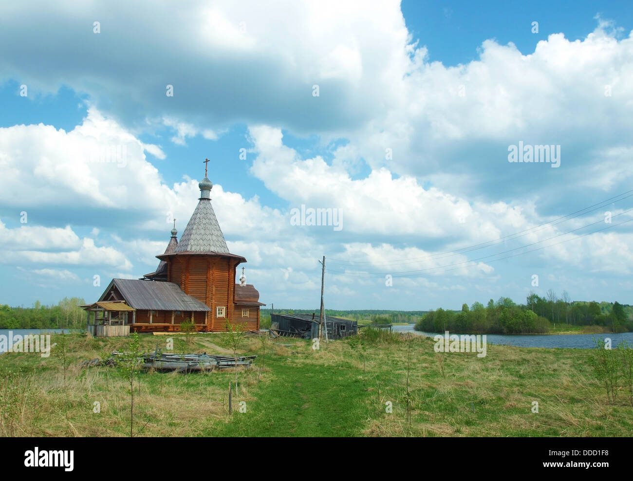 Church in village in the spring, Karelia, Russia Stock Photo