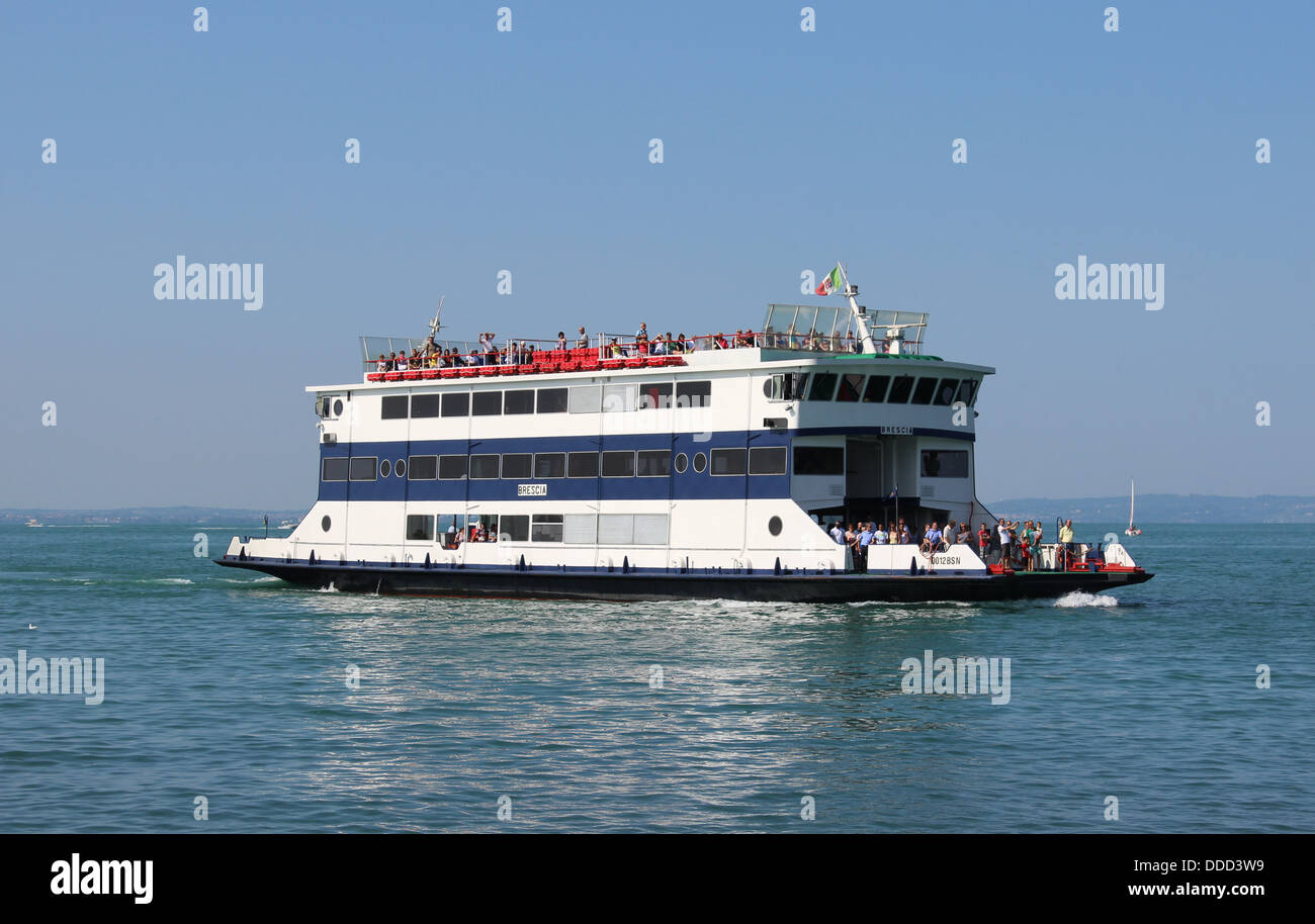 Brescia A Passenger Ferry On Lake Garda In Italy Approaching The brescia-a-passenger-ferry-on-lake-garda-in-italy-approaching-the