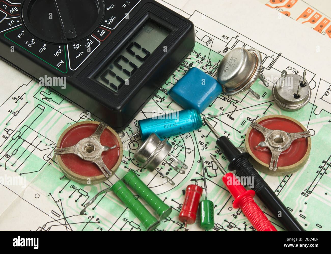 multimeter and electronic components on circuit Stock Photo Alamy