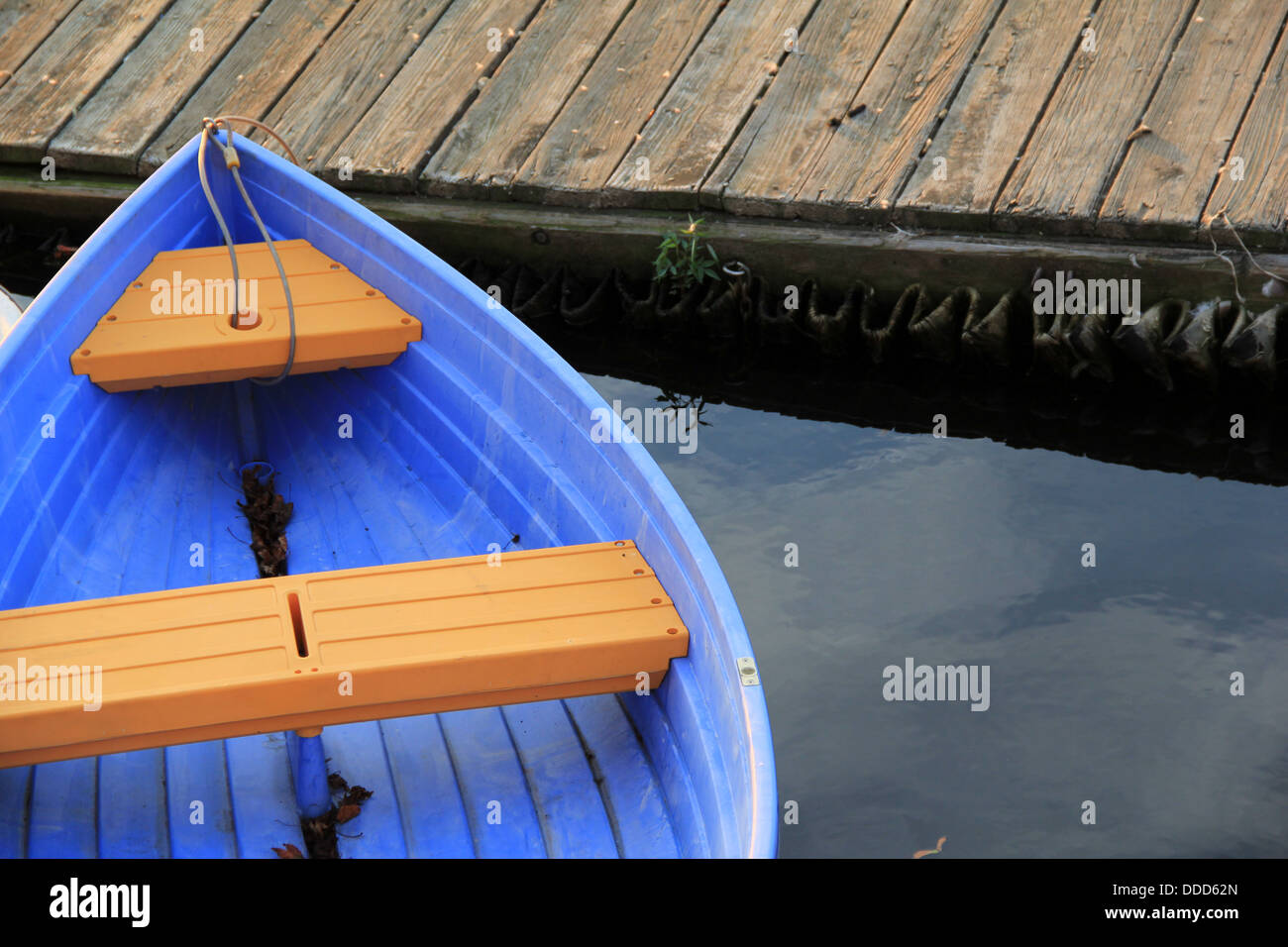 Fishing boat tied to pier hi-res stock photography and images - Alamy
