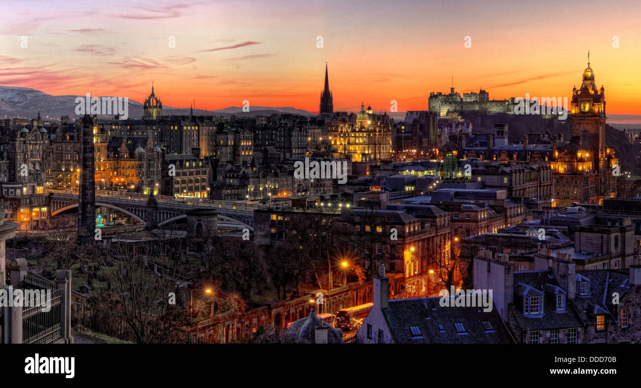 View over Edinburgh city Calton Hill at sunset showing buildings, castle, bridges and churches etc, Scotland Stock Photo