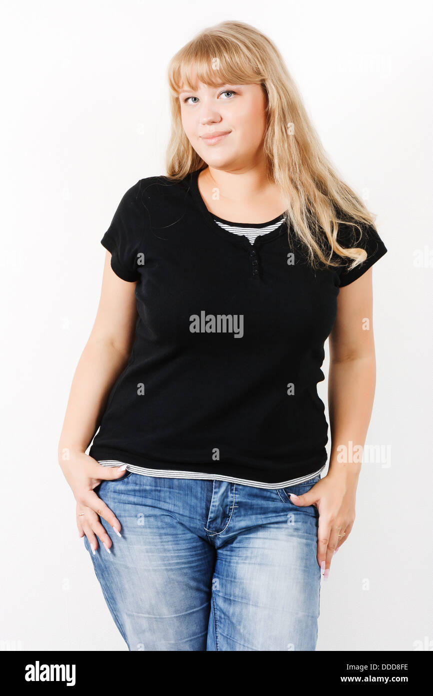 The girl in a black T-shirt and blue jeans Stock Photo - Alamy