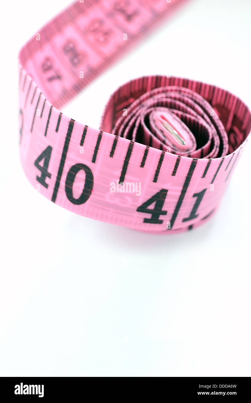 Pink measuring tape Stock Photo by ©DLeonis 3439064