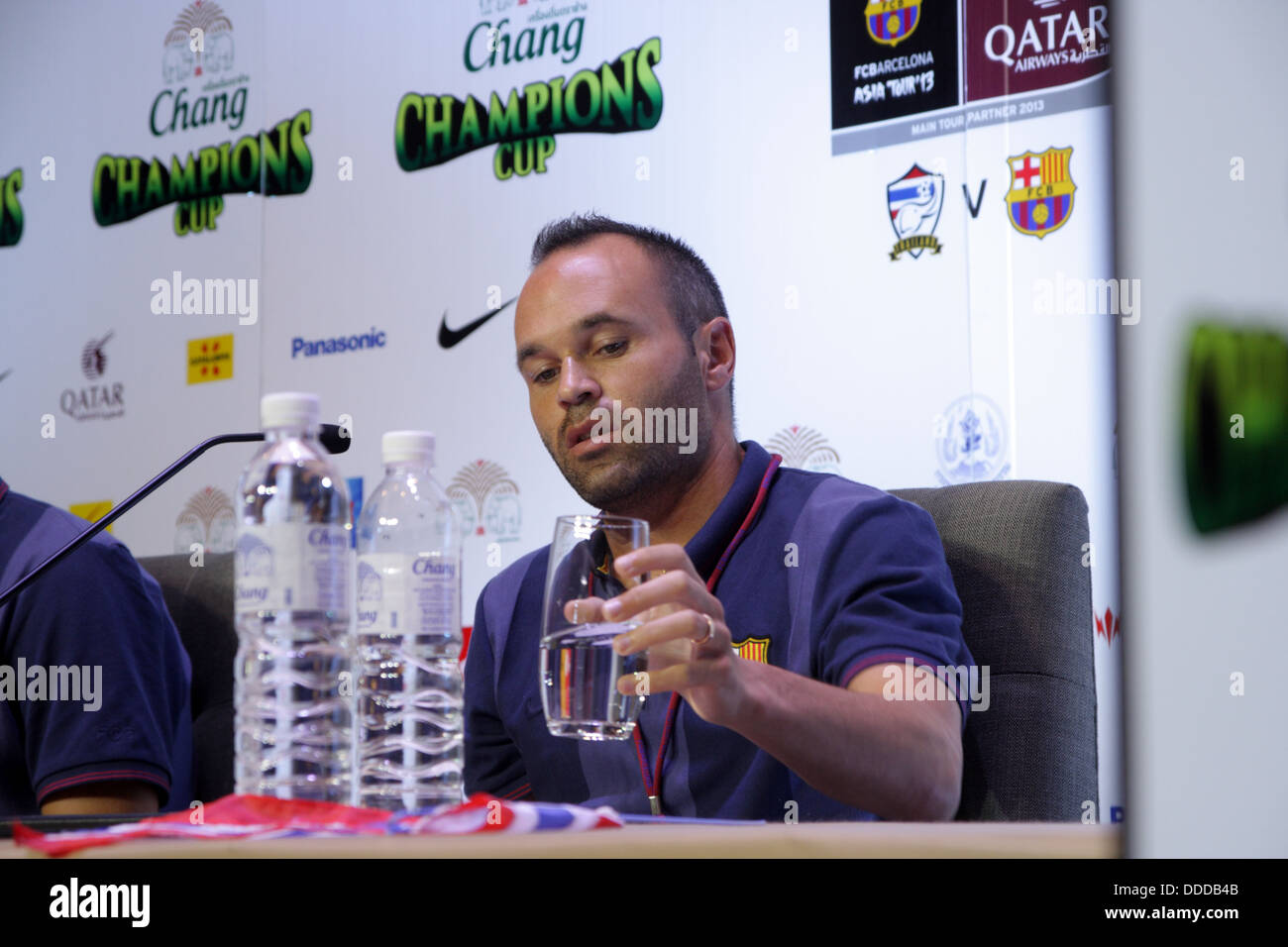 Barcelona football player Andres Iniesta answering media question during a press conference at the Okura hotel in Bangkok . Stock Photo