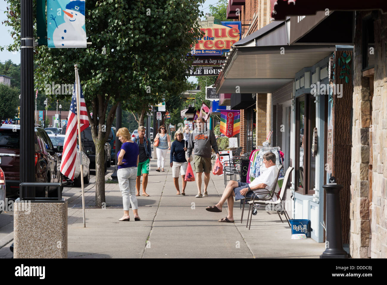 Tourists relaxing and shopping on the street downtown Pentwater, MI